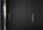 Modern custom wardrobe with minimalist styling, premium materials, and elegant storage solutions designed to enhance luxury bedroom interiors.